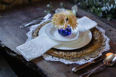 High angle view of flower in plate on table