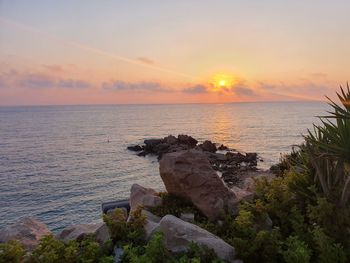 Scenic view of sea against sky during sunset