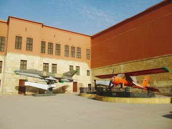 Low angle view of buildings against sky in city