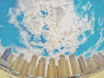 Low angle view of built structure against blue sky