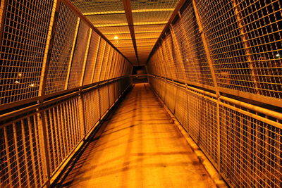 Illuminated corridor of building