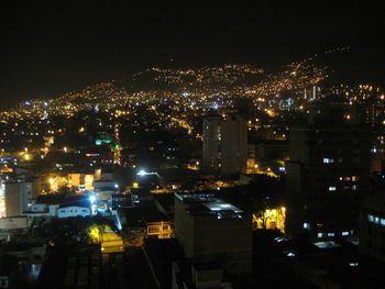 Illuminated cityscape at night