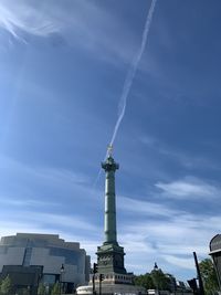 Low angle view of buildings against blue sky