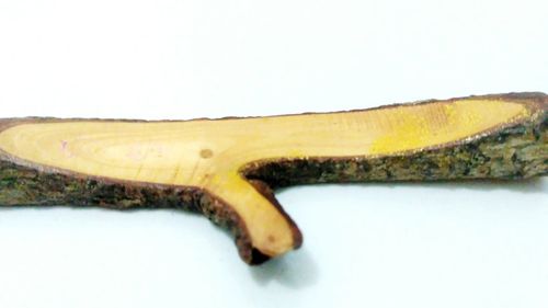 Close-up of bananas over white background