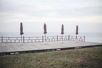 Pier on sea against sky