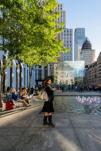 Woman standing in city