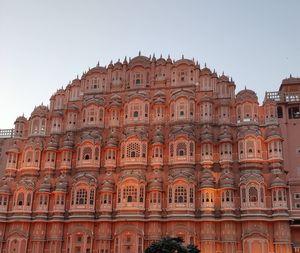 Low angle wide view of hawa mahal against clear blue sky