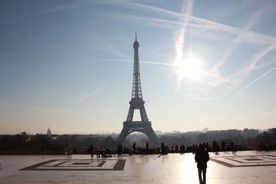 Eiffel tower against sky during sunny day