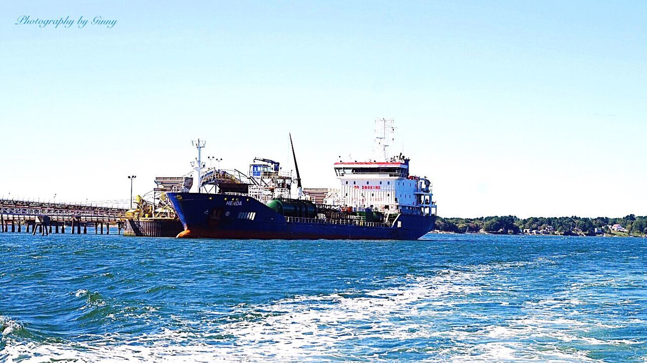 SHIP IN SEA AGAINST CLEAR SKY