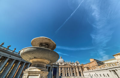 Low angle view of building against blue sky