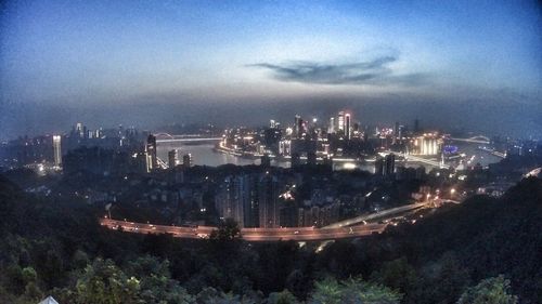 Illuminated cityscape at night