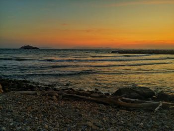 Scenic view of sea against sky during sunset