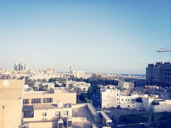 Buildings against clear sky