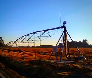 Close-up of swing against clear blue sky