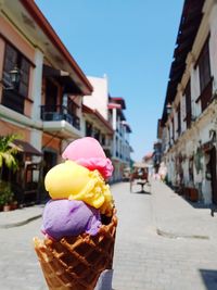 Woman holding ice cream cone