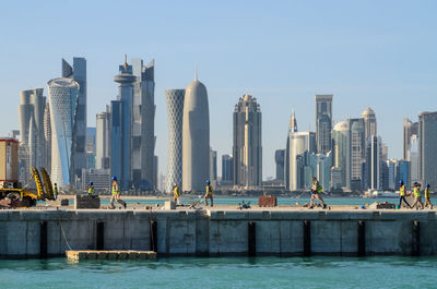 View of city buildings against sky