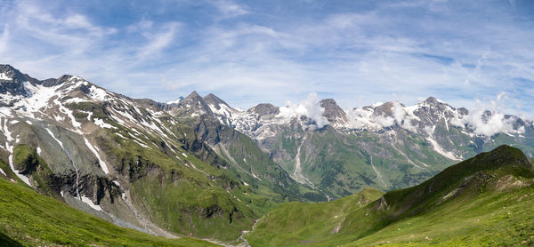 Scenic view of snowcapped mountains against sky