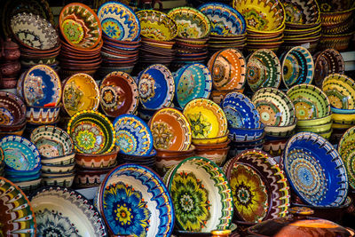 Full frame shot of colorful bowls for sale at market stall