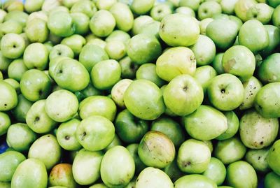 Full frame shot of granny smith apples at market for sale