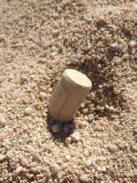 Close-up of pebbles on sand