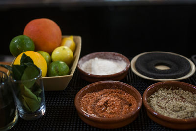 Close-up of fruits in bowl on table