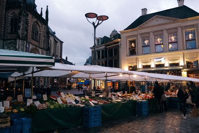 People at street market in city