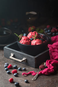 Close-up of strawberries in container on table