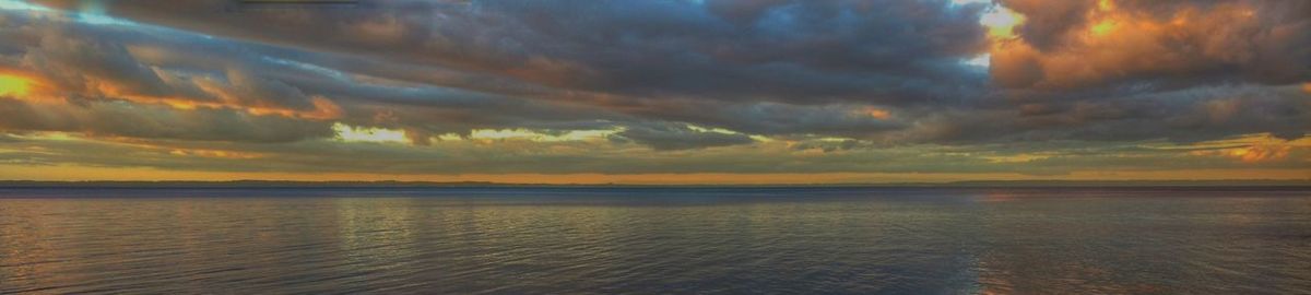Scenic view of dramatic sky during sunset