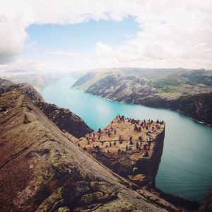 Scenic view of mountains against cloudy sky