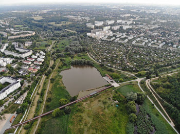 High angle view of river amidst buildings in city