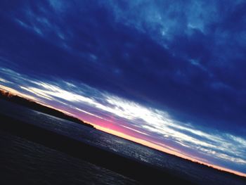 Scenic view of sea against dramatic sky