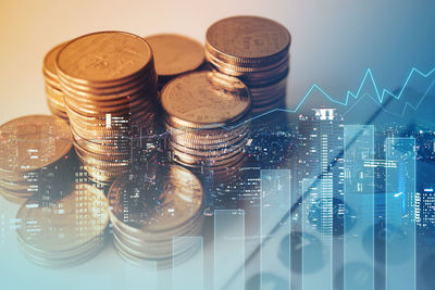 High angle view of coins in glass