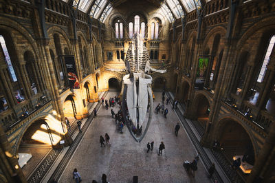 Group of people in illuminated building