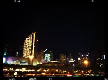 Illuminated cityscape at night