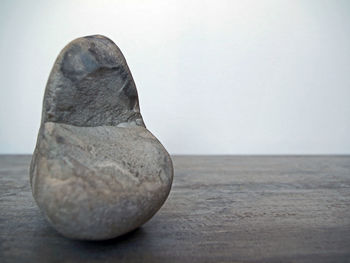 Close-up of stone sculpture on table