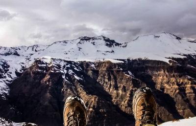 Scenic view of mountains against sky during winter