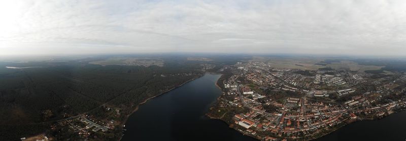 High angle view of buildings in city against sky