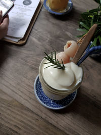 High angle view of person preparing food on table