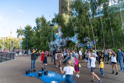 Group of people in town square