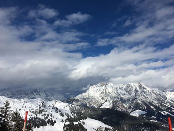 Scenic view of snowcapped mountains against sky