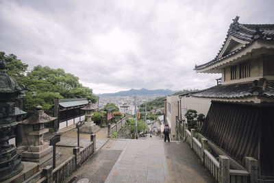 Built structure against cloudy sky