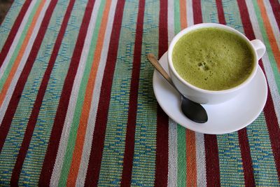 High angle view of matcha tea on table