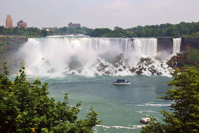 Waterfall with lake in foreground