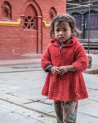 Portrait of girl standing outdoors