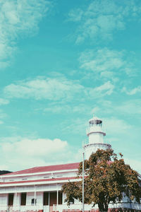 View of building against cloudy sky