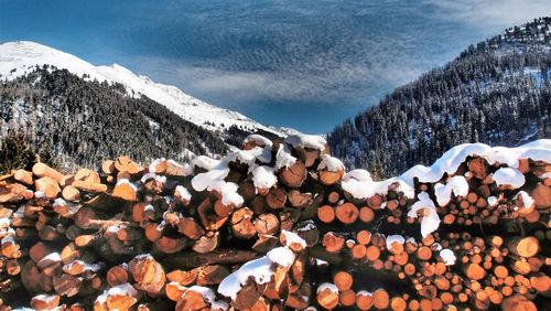 Scenic view of snow covered mountains against sky