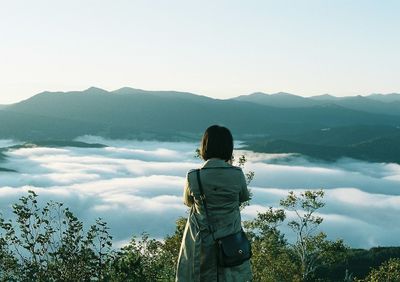 Woman standing on mountain