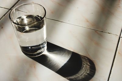 High angle view of water in glass on table