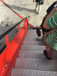 Low section of people walking on steps