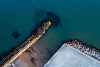High angle view of rusty ship in sea